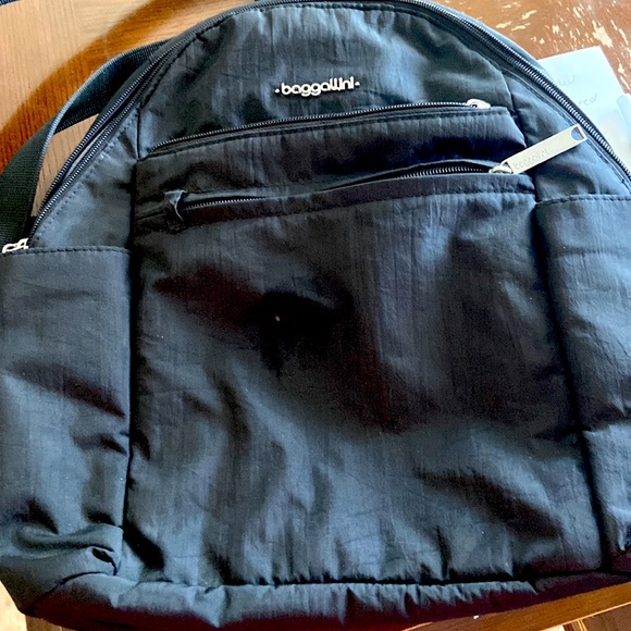 Baggallini Handbags - Baggallini backpack/diaper bag plenty of pockets, wallet space safe on back